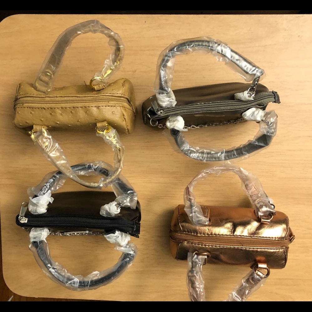 Susan Graver purses that never been used.